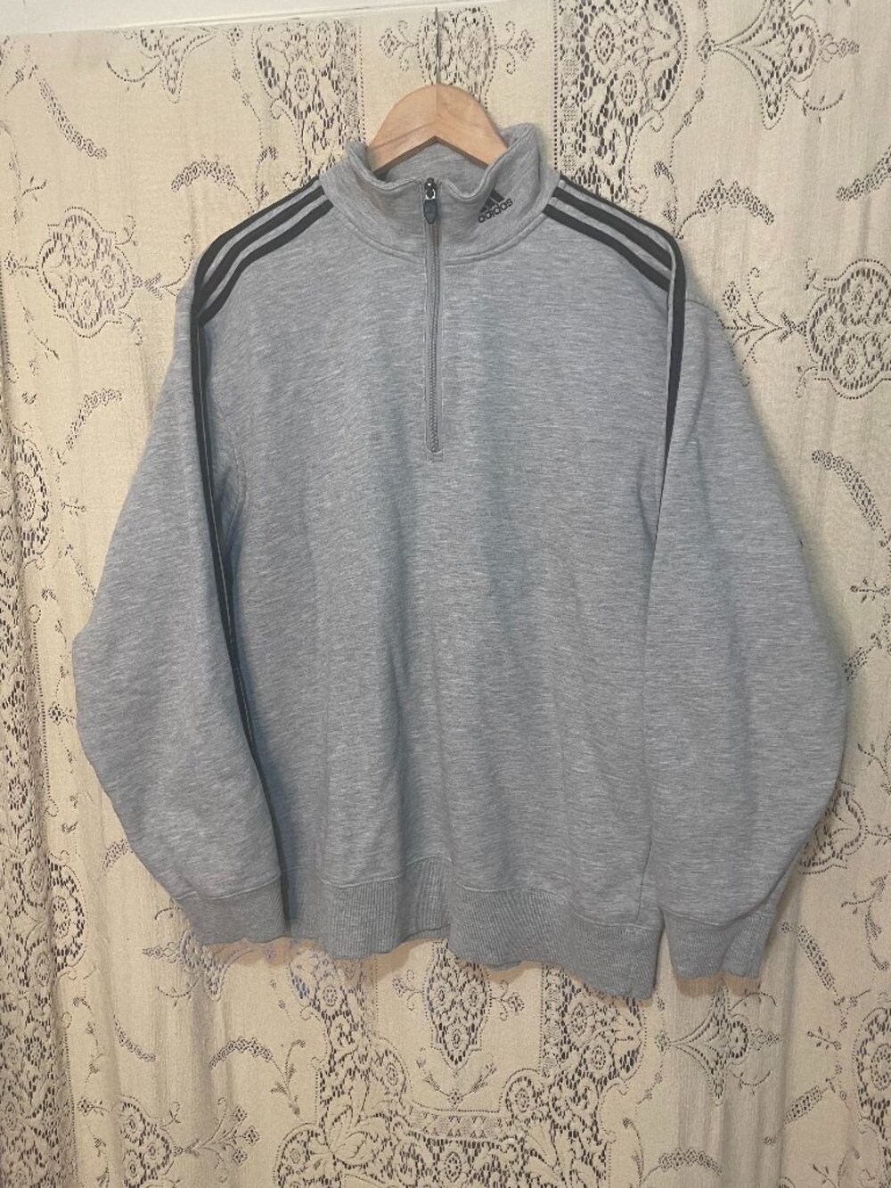 Adidas: grey 1/4 zip with stripes down arms